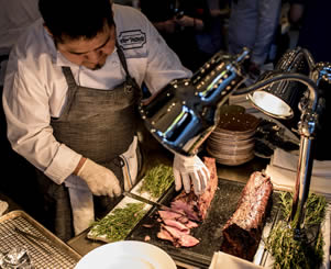 chef slicing bbq