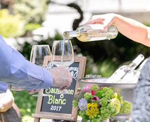 pouring sauvignon blanc